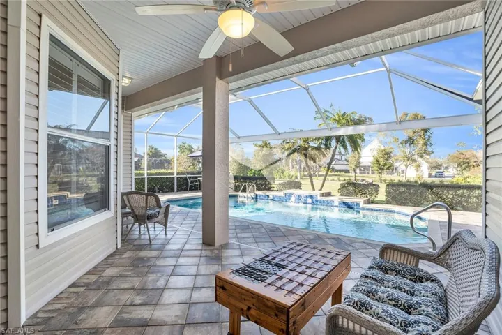 Large lanaii with extra space for seating and dining and access to bathroom