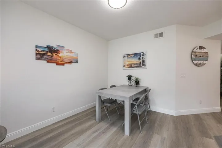 Dining room featuring wood-type flooring