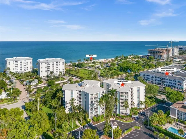 Prime west-facing corner unit offering tranquil pool views and glorious Naples sunsets