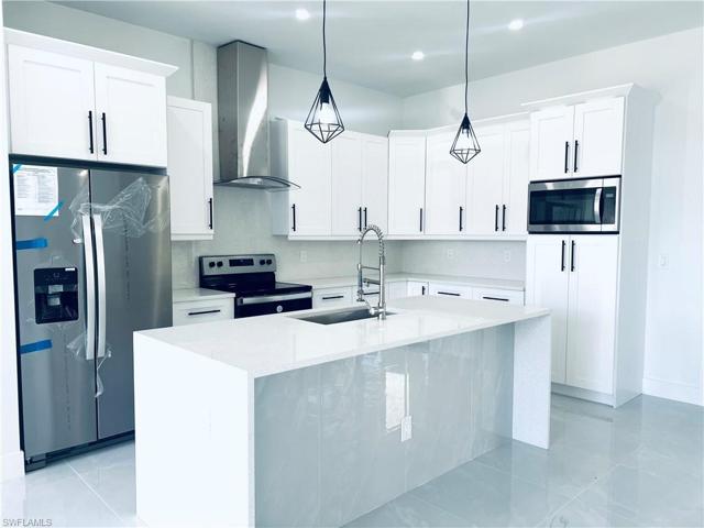 604 W 16th ST, LEHIGH ACRES FL 33972