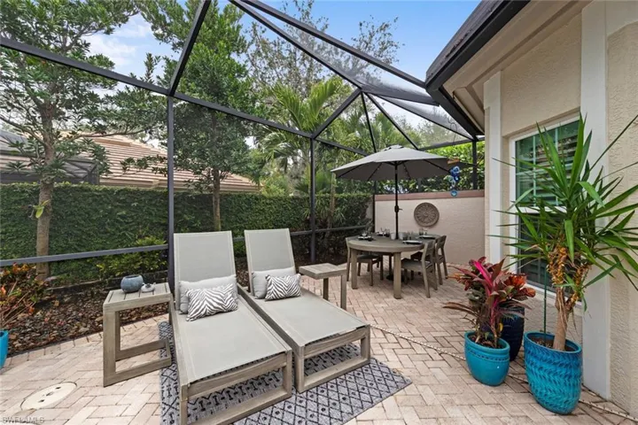 View of patio with glass enclosure