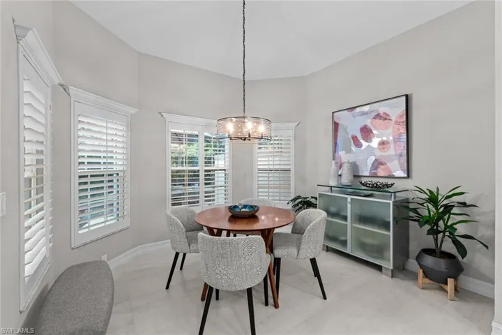 Dining space with a chandelier