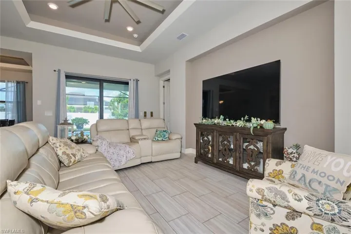 Living room with a tray ceiling