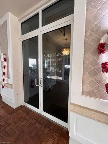 Doorway to property featuring french doors