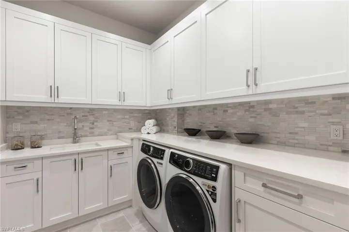 Laundry Room main level provides everything you need fitted with Electrolux Washer/Dryer 2nd Laundry Upstairs