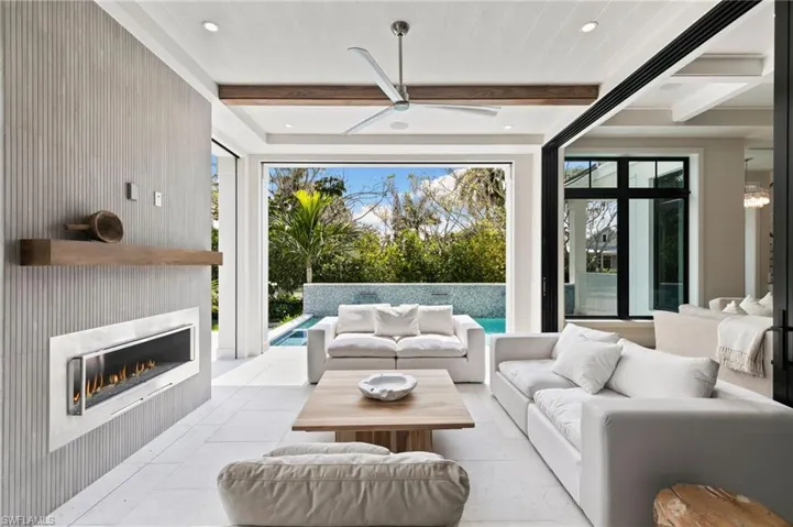 Open to the Entire Main Living, this Outside Living has screens for use in the evening and Storm Shutters for Rain and Storm Protection