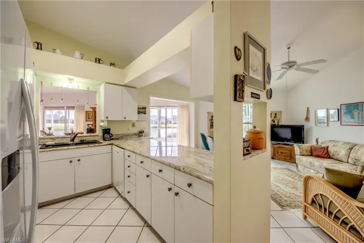 Kitchen with Newer SXS Refrigerator and Microwave