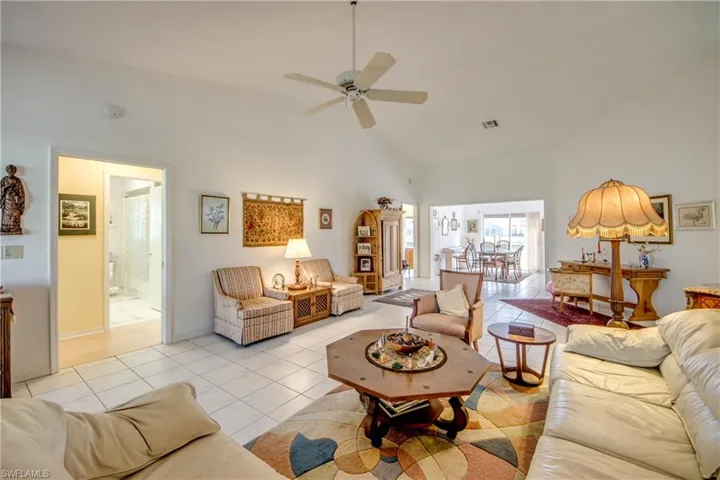 Living Room Looking to Guest Quartersfan, and light tile floors