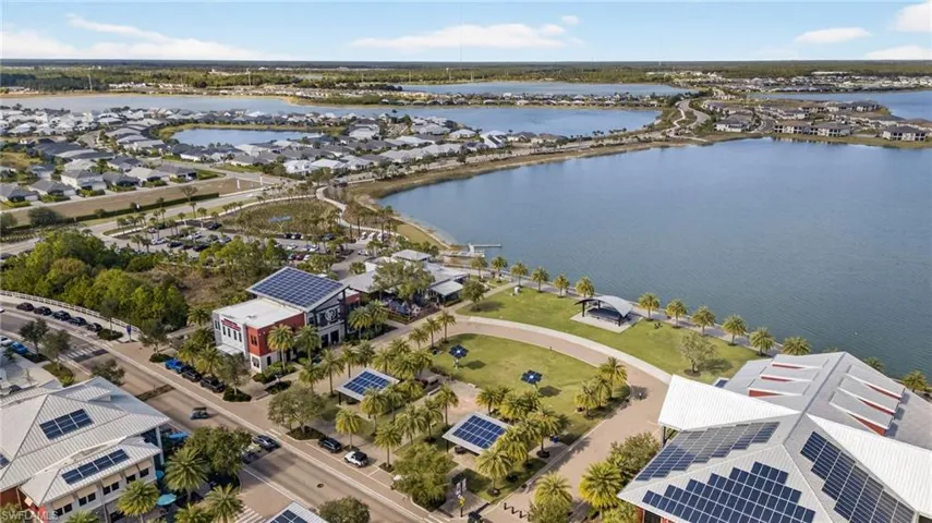 Aerial view of residential area with a large body of water