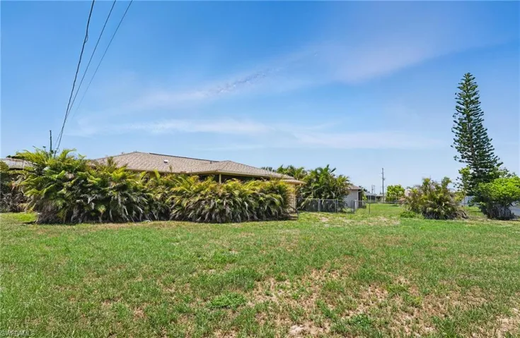 View of fenced back yard