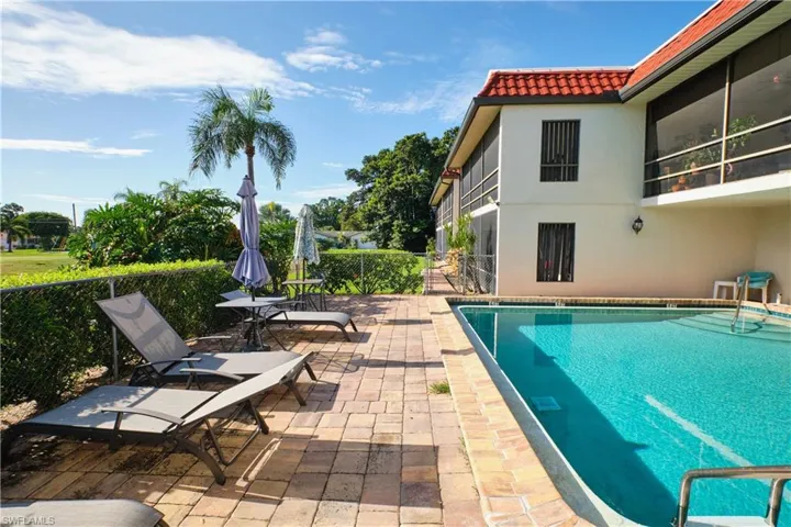 View of swimming pool with a patio