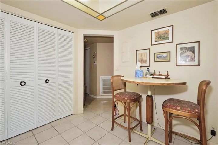 Dining room featuring light tile patterned flooring