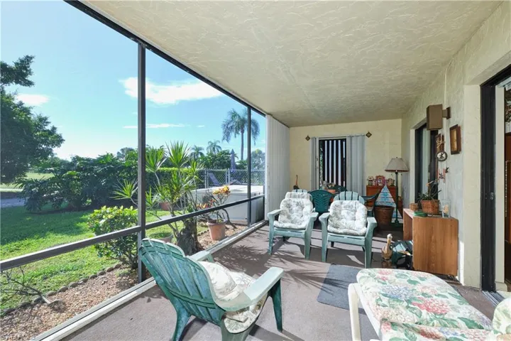 Sunroom featuring floor to ceiling windows