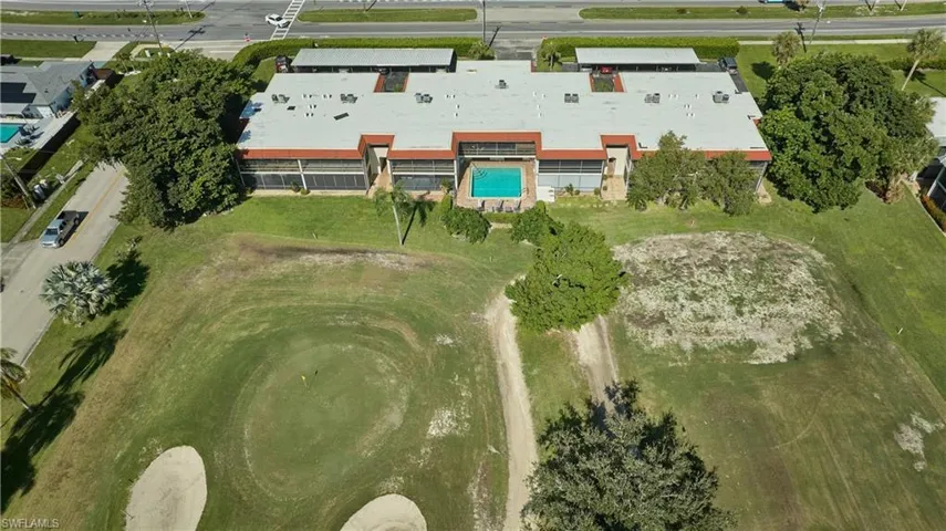 Aerial overview of property's location with a pool