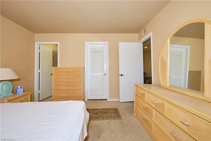 Bedroom with baseboards and a closet