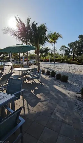 SANDY AREA BY THE POOL