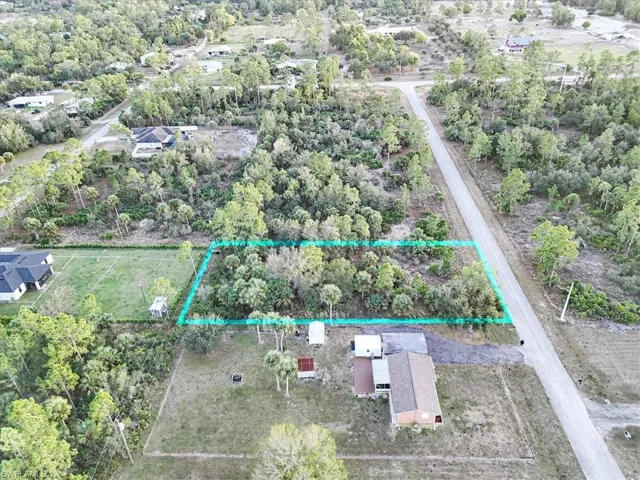 Aerial overview of property's location with property parcel outlined