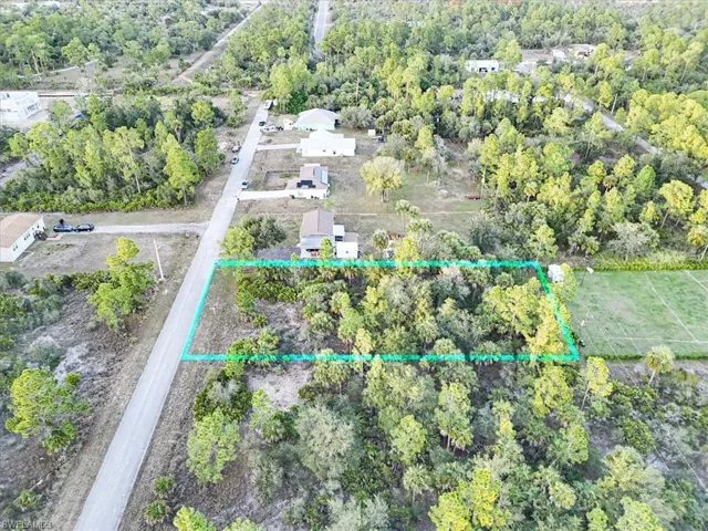 Aerial overview of property's location featuring property boundaries highlighted