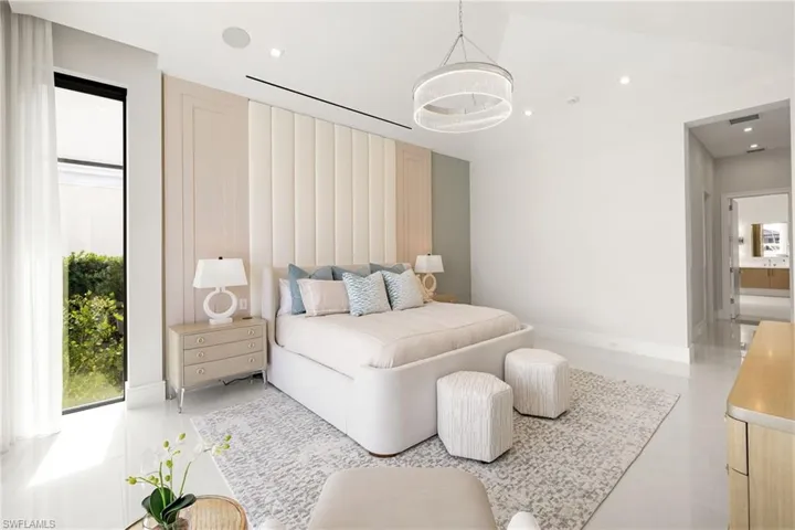 Bedroom featuring recessed lighting and baseboards