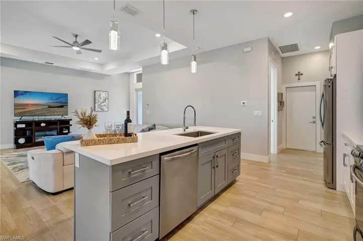 Quartz countertops with room for 4 seats.