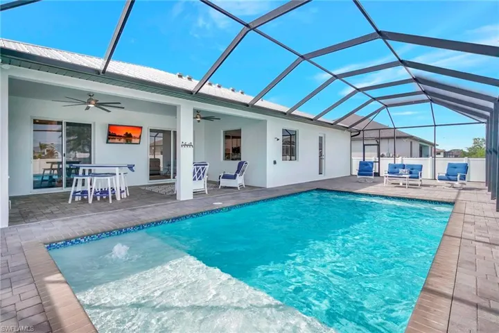 Huge outdoor entertaining area w/ salt water pool!