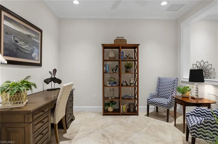 Office area featuring ceiling fan