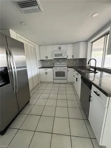 1402 SE 34  ST, Cape Coral, FL 33904