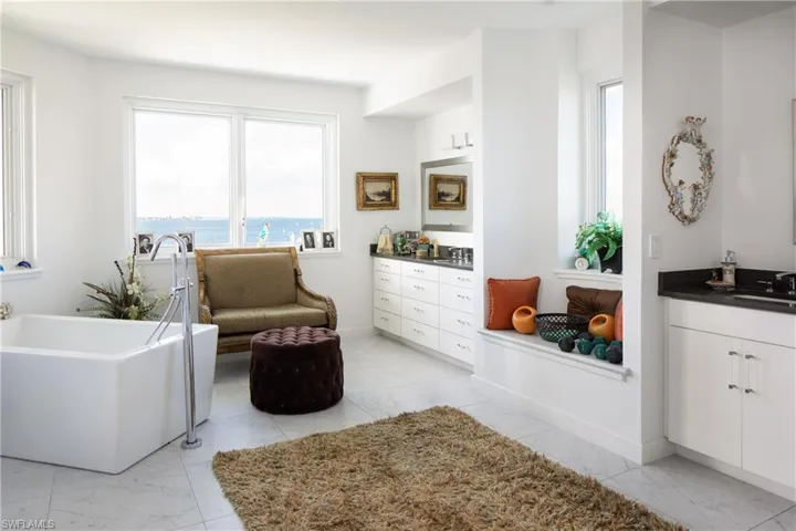 Living area with light marble finish flooring