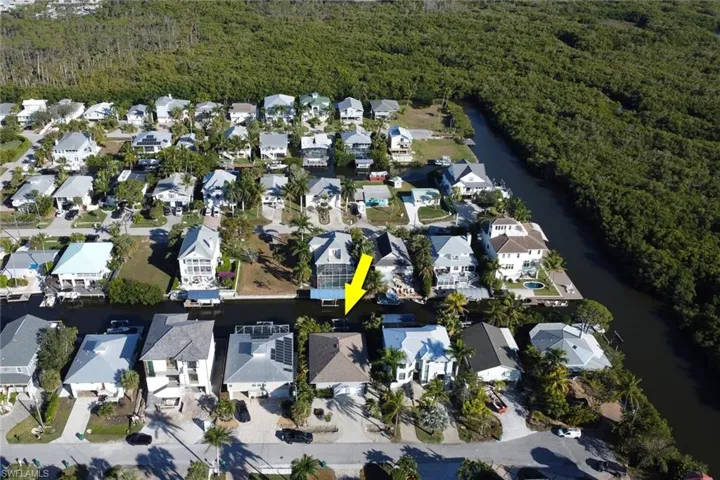 View of property location with nearby suburban area