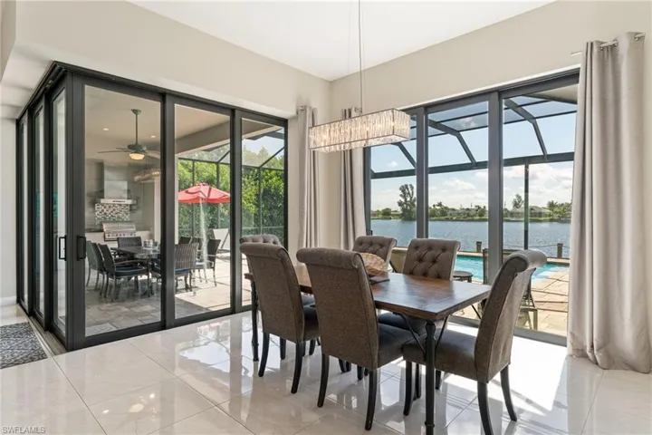 Dining area featuring a water view