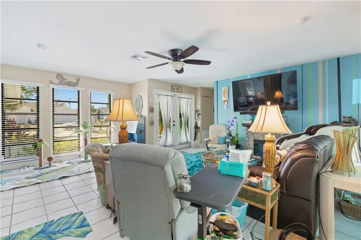 View of Sunlit Windows, Double Door Entryway [with Screened Foyer].