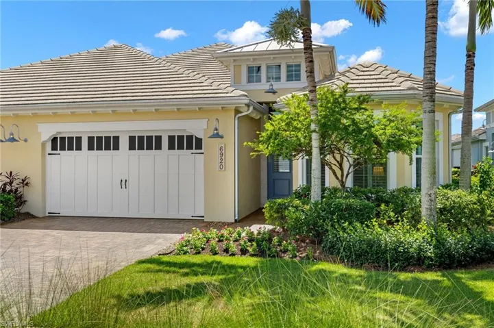 View of front of property with a garage