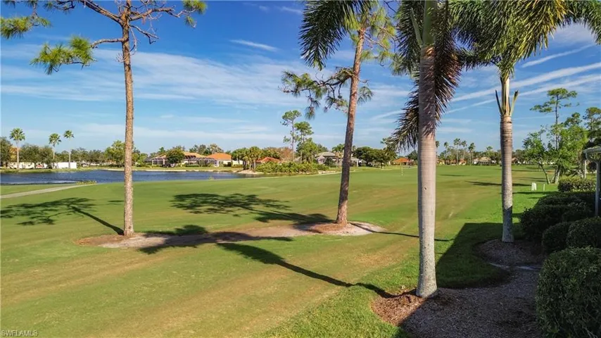 Overlooking the 9th fairway, lake, clubhouse