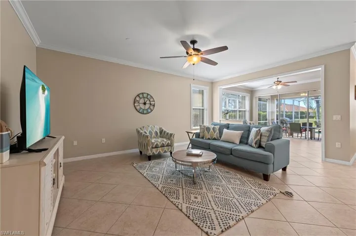 28526 Guiivere Way Bonita Springs FL 34135  - Fully tiled living area opens to sunroom