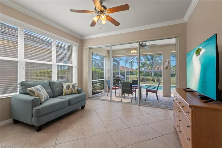 28526 Guiivere Way Bonita Springs FL 34135  - Sunroom with triple slider access to lanai and pool area
