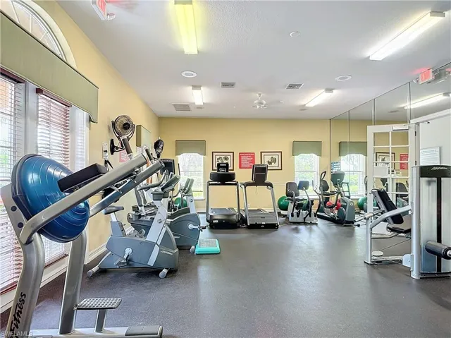 Exercise room featuring ceiling fan