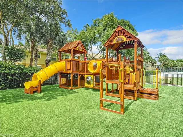 View of jungle gym featuring a yard