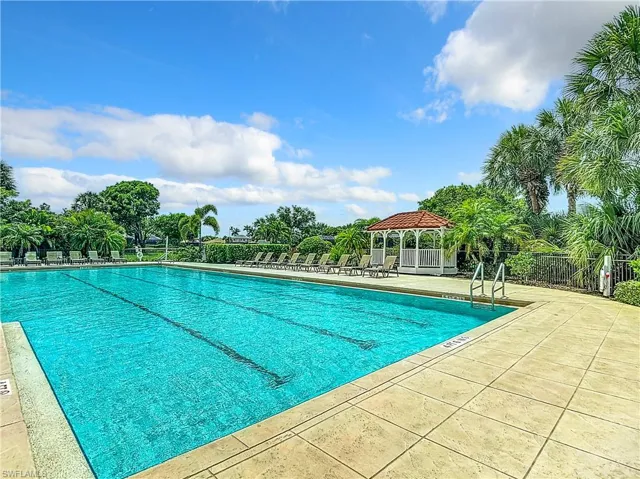 View of swimming pool with a patio and a gazebo