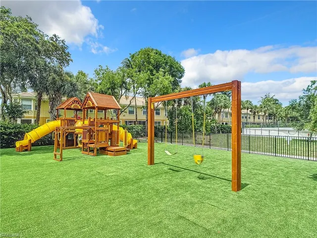 View of jungle gym featuring a yard