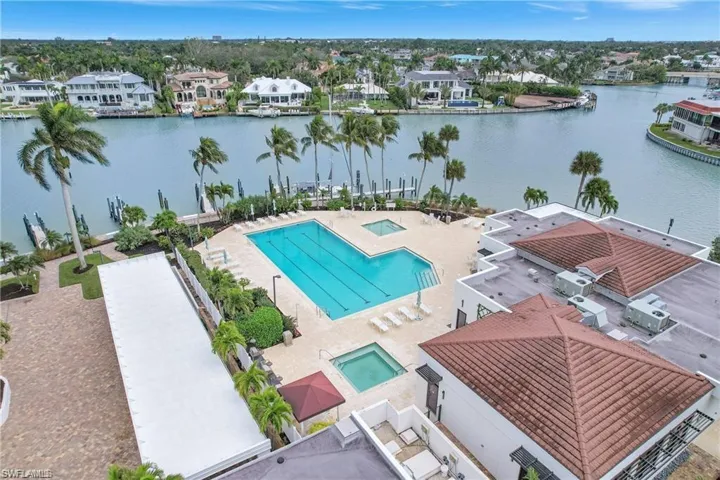 Aerial view of Moorings bay, the Bay side Pool, Spa, BBQ's and Marina