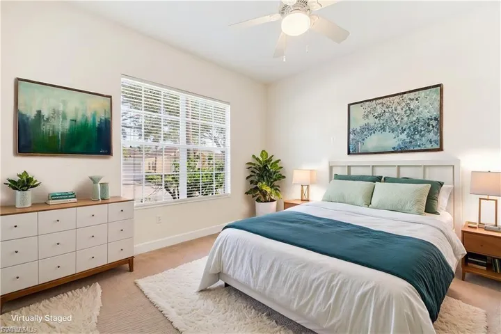 Virtually stage front bedroom.