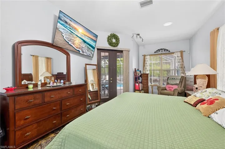 Bedroom featuring french doors and access to outside