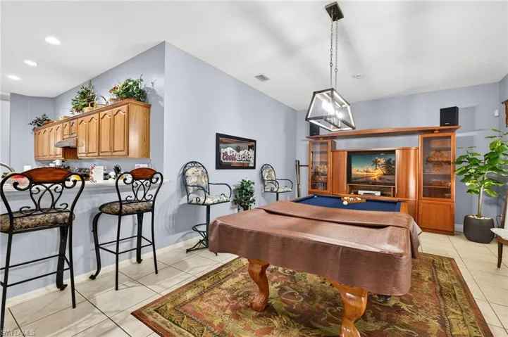 Playroom with pool table, light tile patterned floors, and recessed lighting