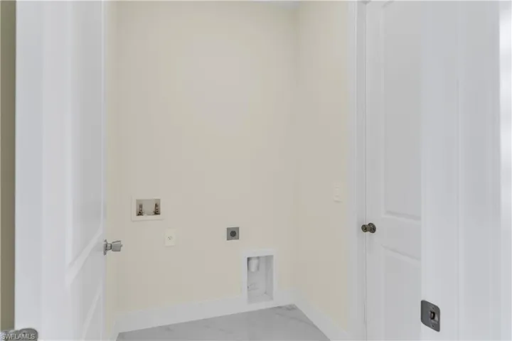 Laundry room featuring hookup for an electric dryer and washer hookup