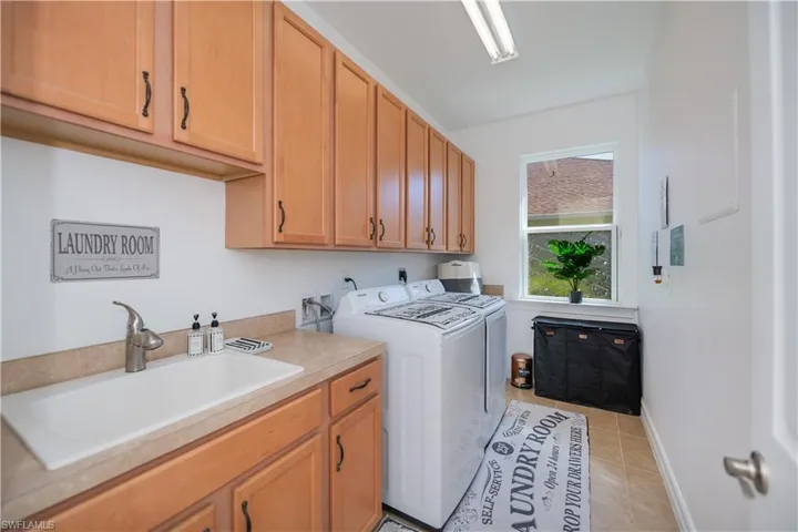 Massive Laundry room with plenty of storage