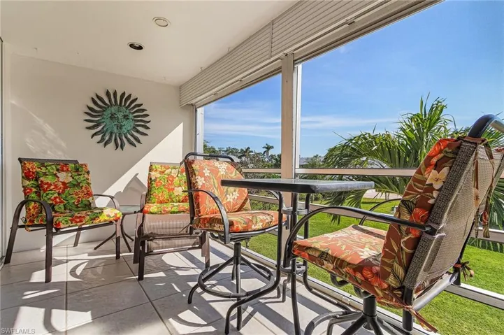 Screened lanai overlooks the landscape area and allows for all day sun with beautiful views of sunrises/sunsets.