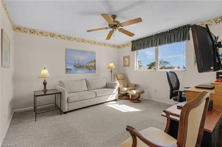 The master bedroom is set up as an office;guest room.
