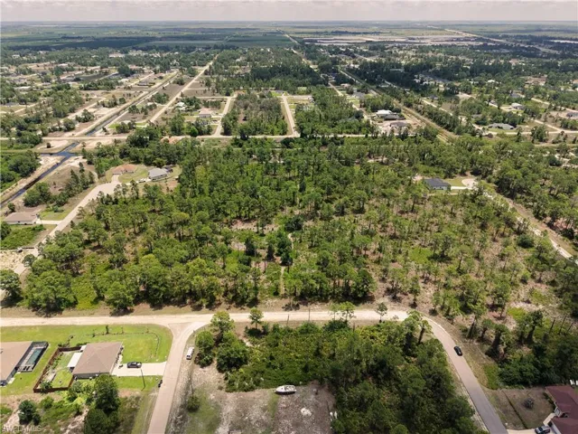 Expansive wooded lot offering substantial privacy