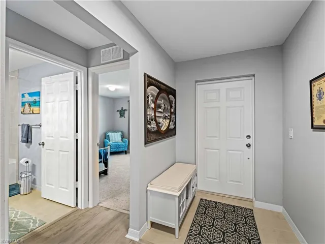 Foyer with baseboards