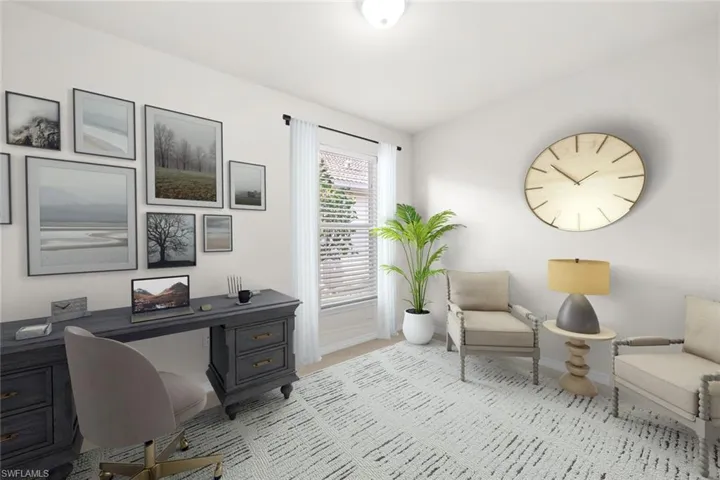 Office area featuring baseboards